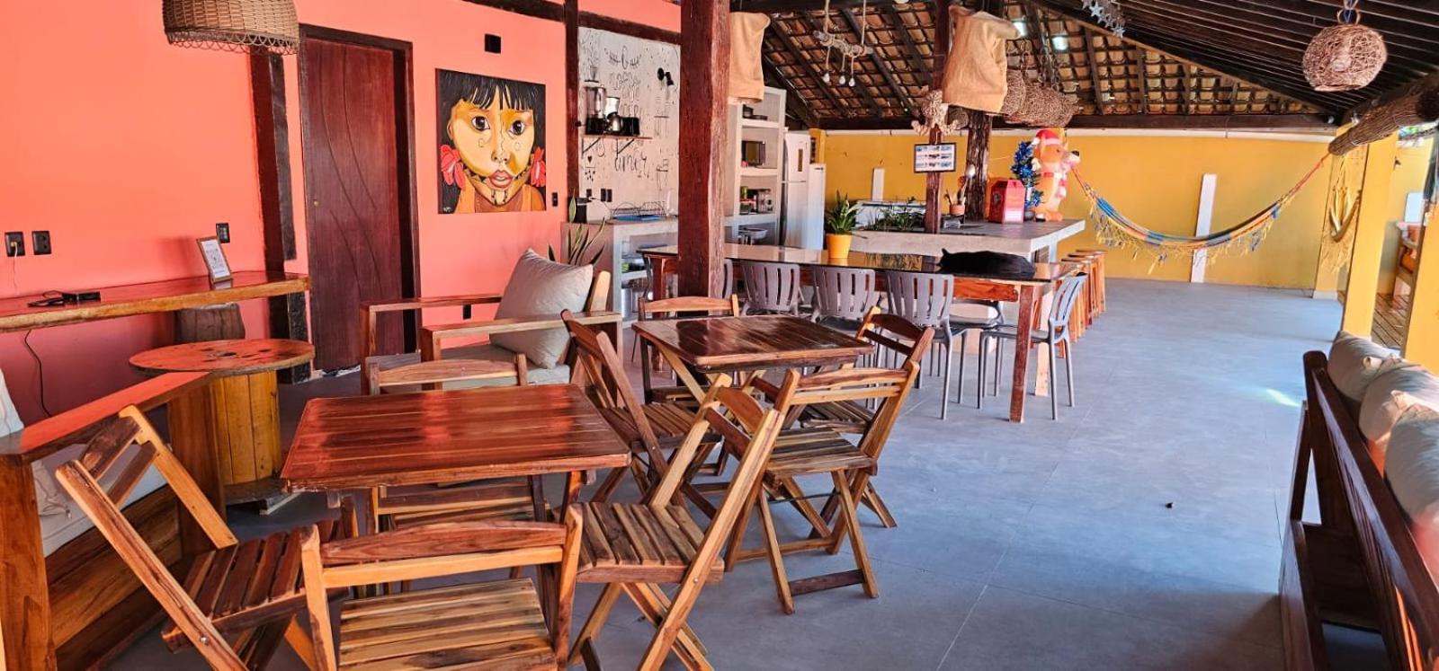Casa Mukau pé na areia