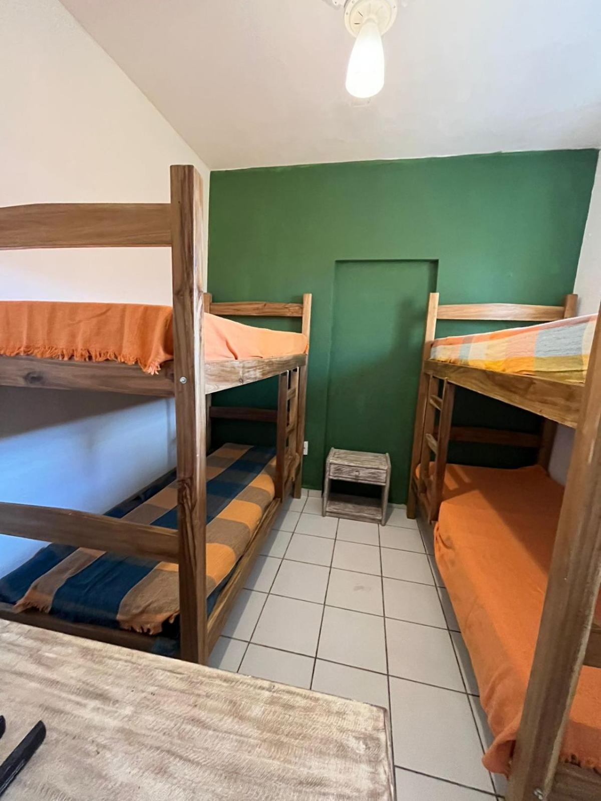 Casa Mukau pé na areia