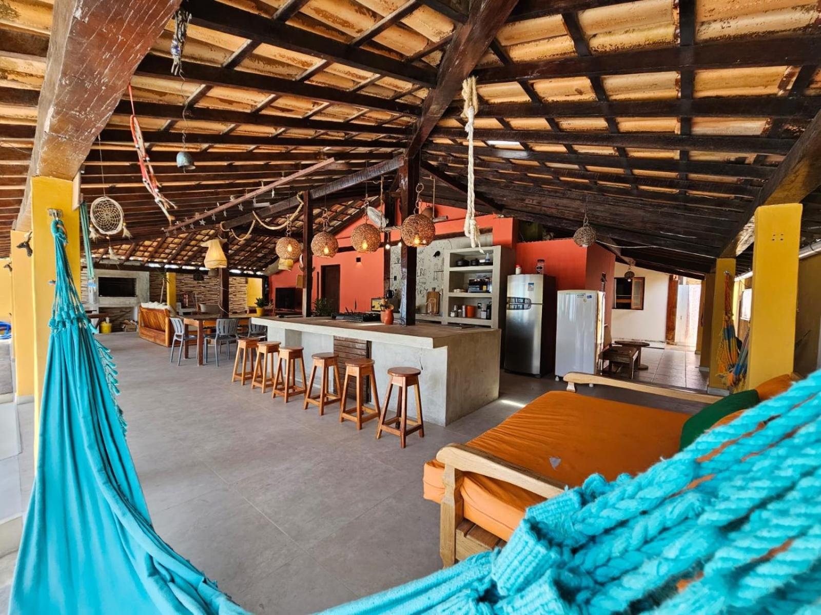Casa Mukau pé na areia