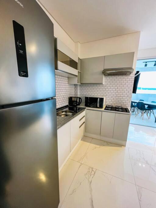 Apartamento em itapema com maravilhosa vista mar