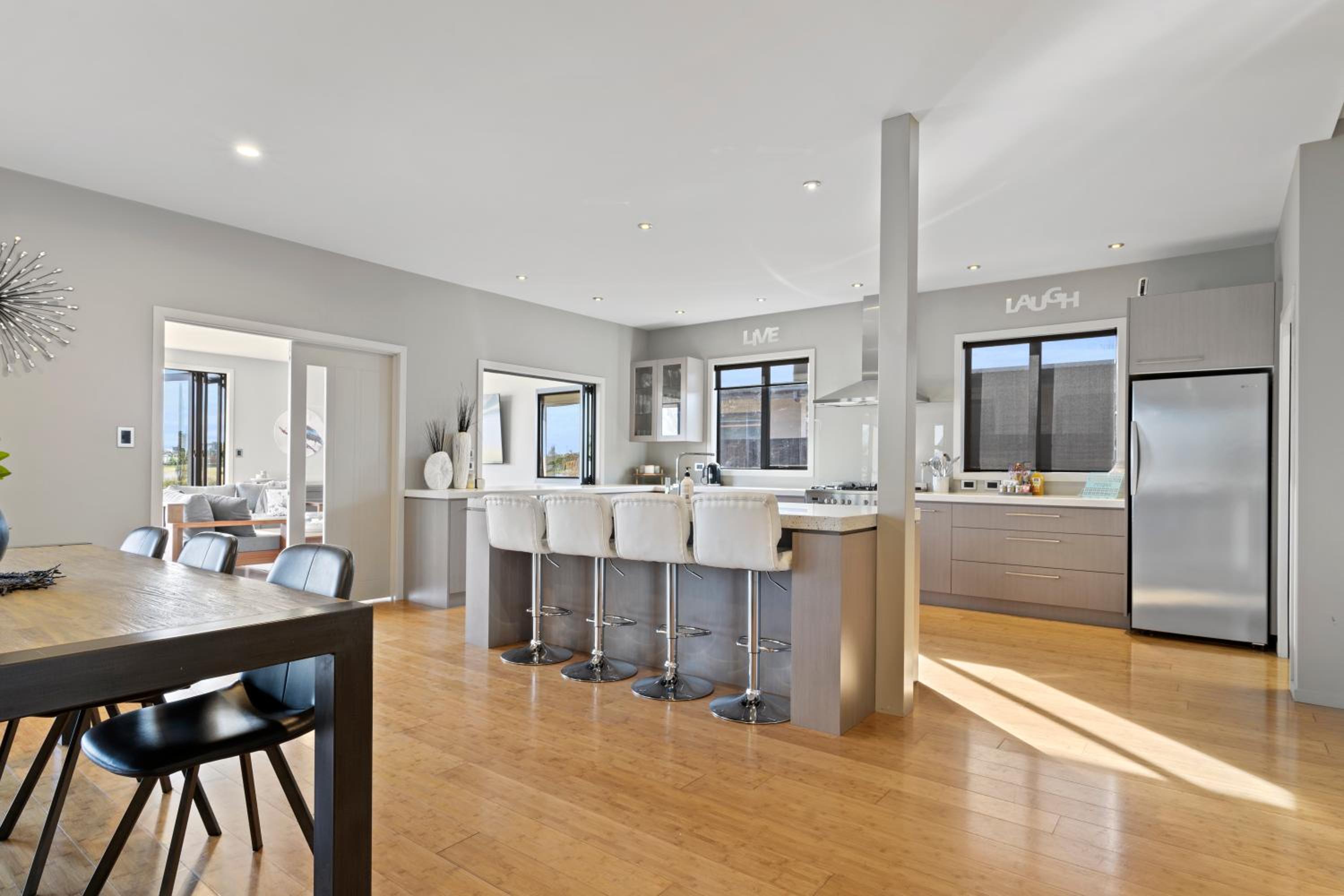 Relax at Lake Hood Luxury Canal Home with Jetty view 2