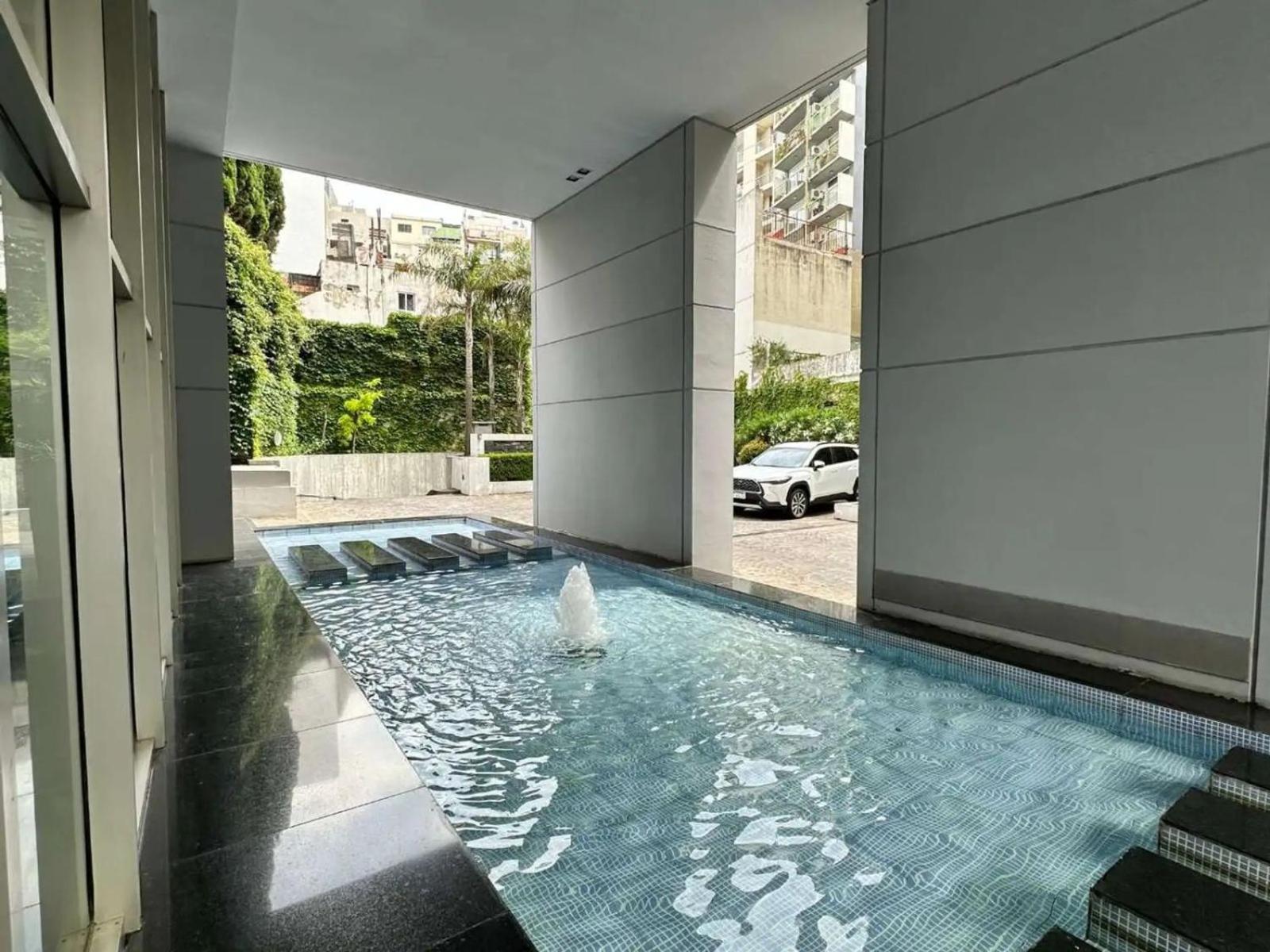 Bright modern apartment with full amenities and parking with 24hs security