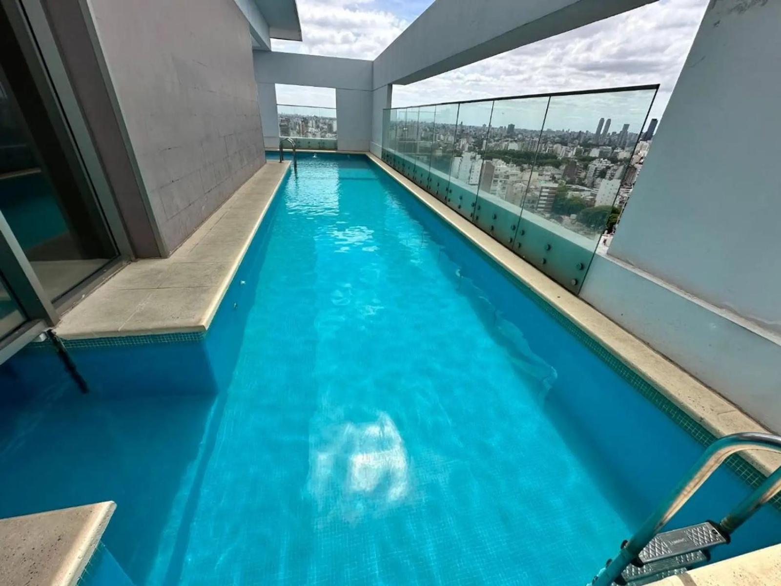 Bright modern apartment with full amenities and parking with 24hs security