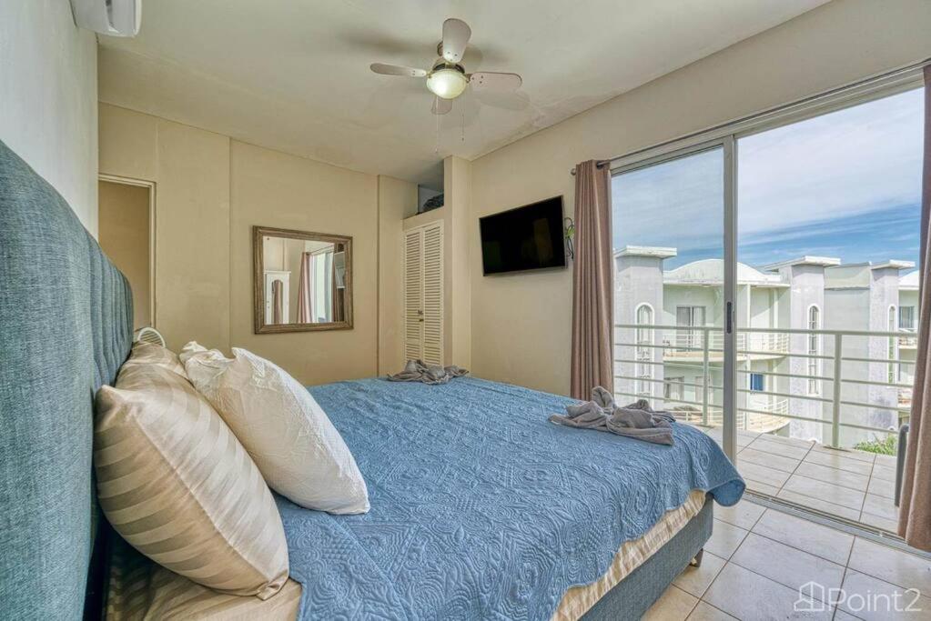 2 Bedroom Vacation Rental in Paradise steps from beach!