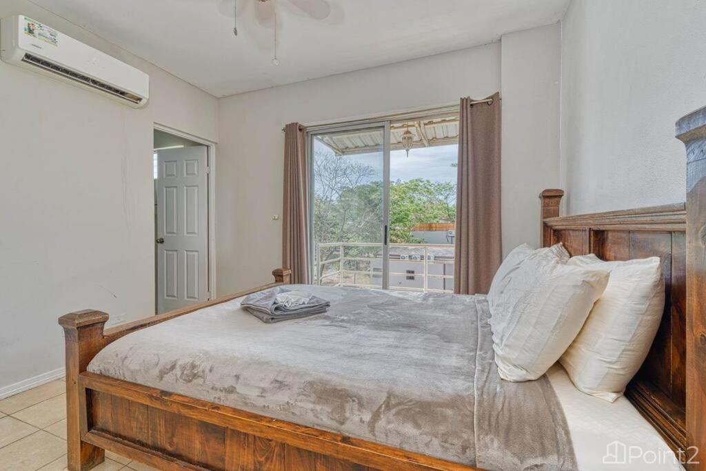 2 Bedroom Vacation Rental in Paradise steps from beach!