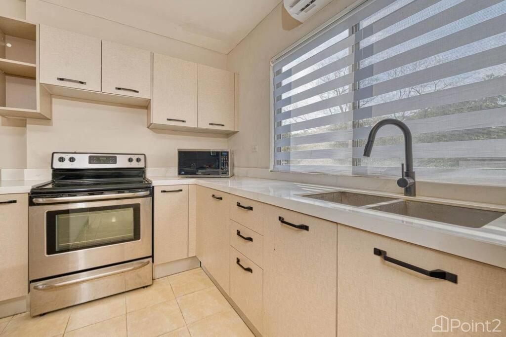2 Bedroom Vacation Rental in Paradise steps from beach!