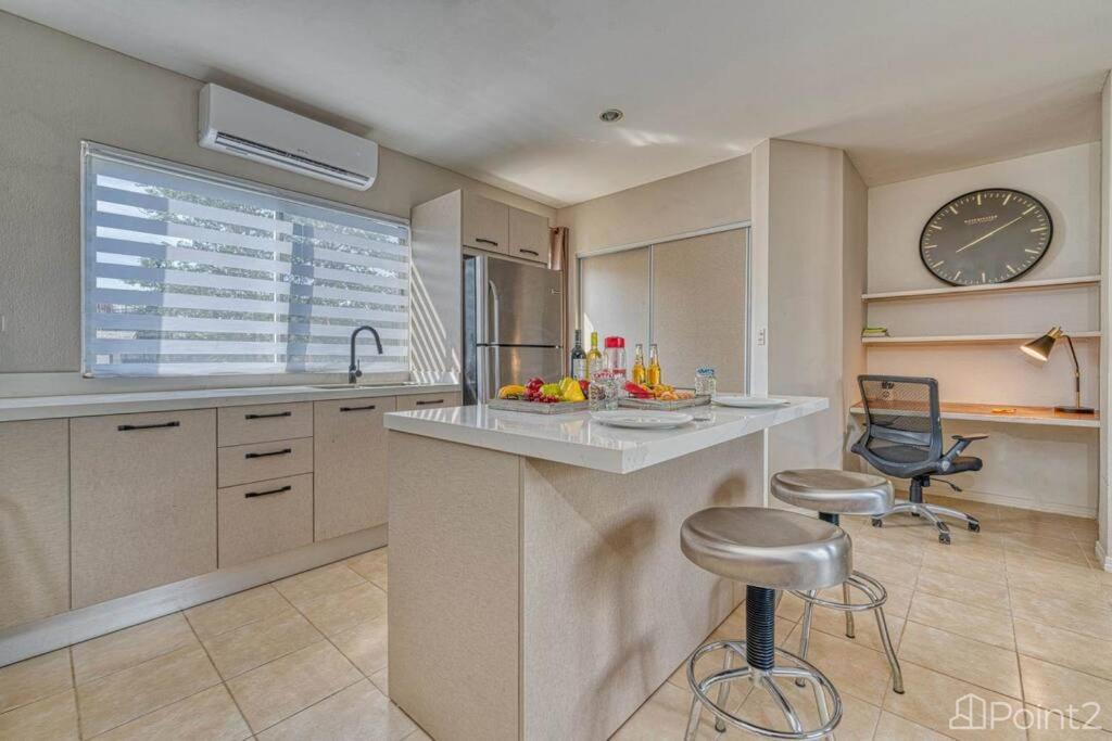 2 Bedroom Vacation Rental in Paradise steps from beach!