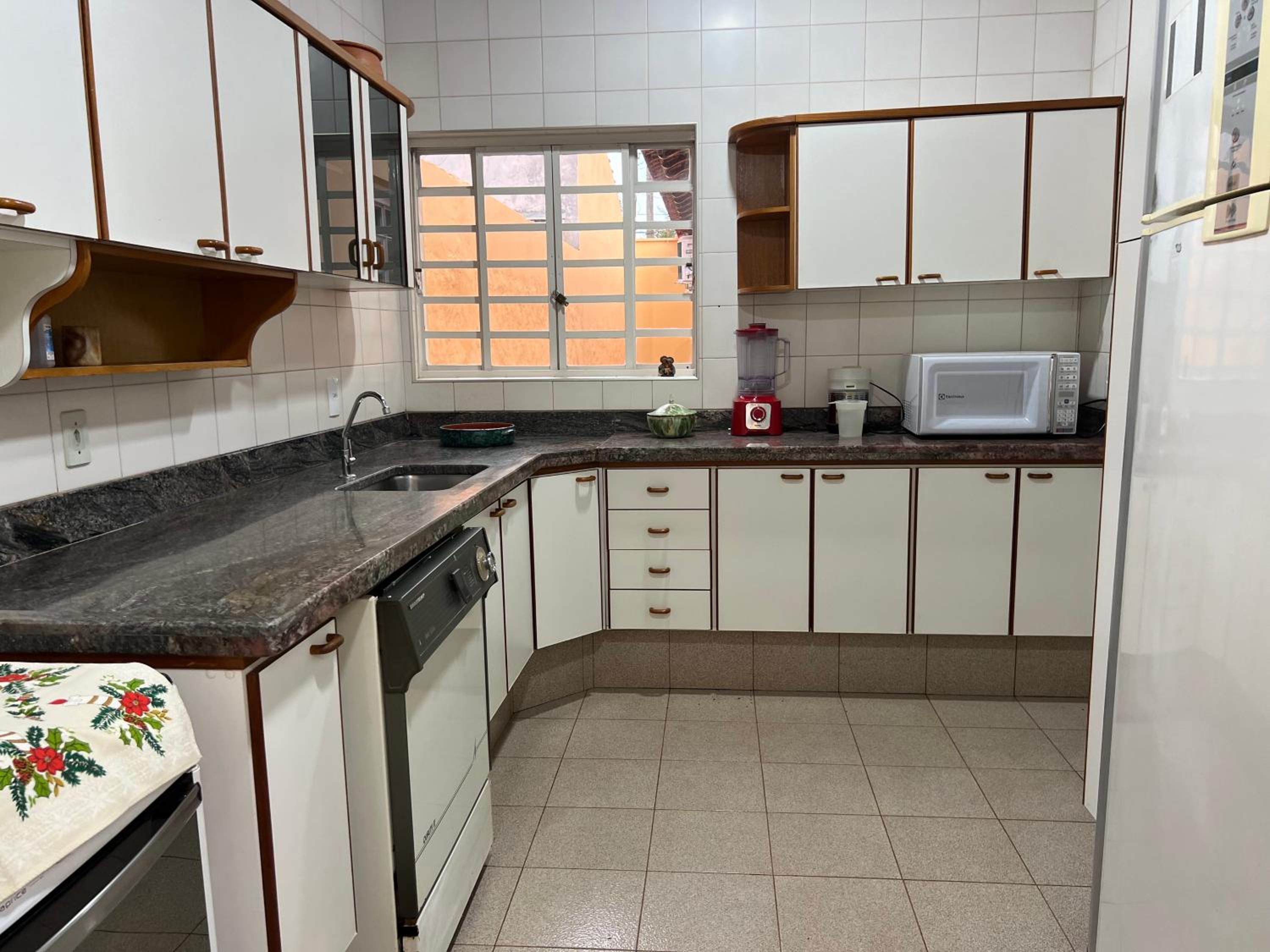 Casa da Vó Loy e seu espaço verde