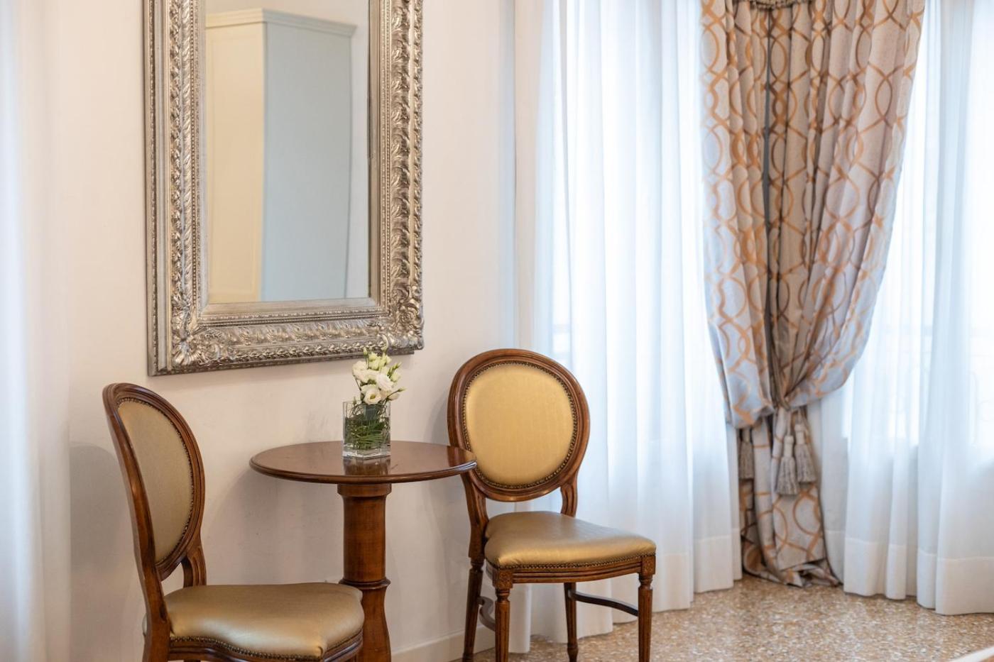 San Teodoro Palace - Luxury Apartments
