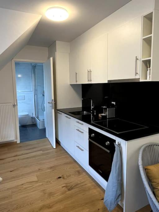 Central & modern penthouse-studio with balcony & air-condition