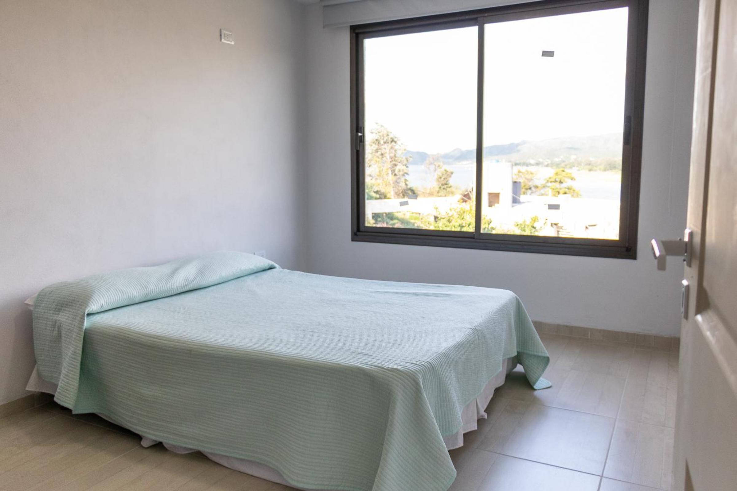 Casa con vista plena al lago y a la ciudad de Villa Carlos Paz IG alquilervillacarlospaz