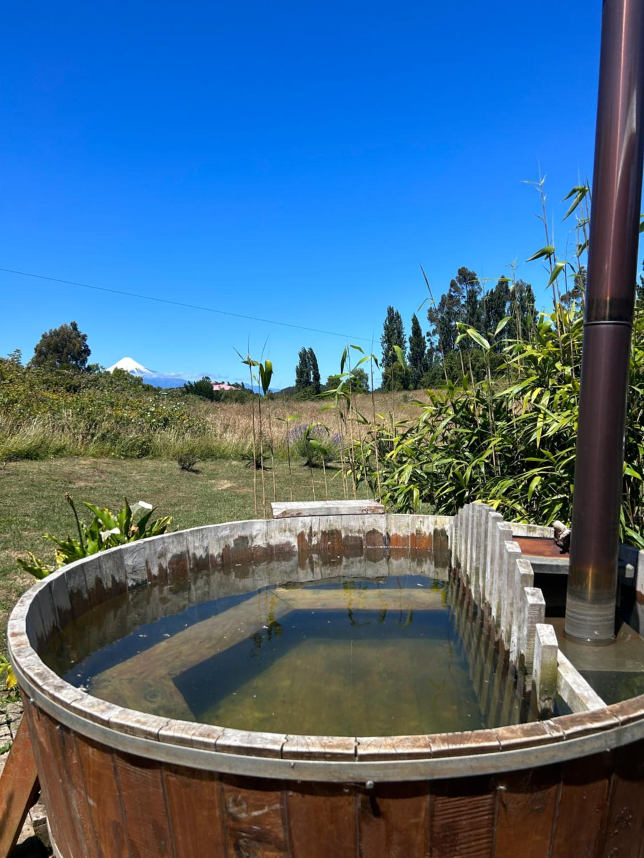 Cabaña acogedora con tinaja privada y vista al volcán, Puerto Octay