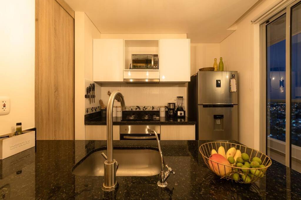 Galería Caribe 2 habitaciones en piso 24 cerca de la playa y centro histórico