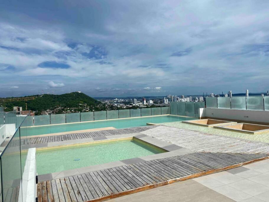 Galería Caribe 2 habitaciones en piso 24 cerca de la playa y centro histórico