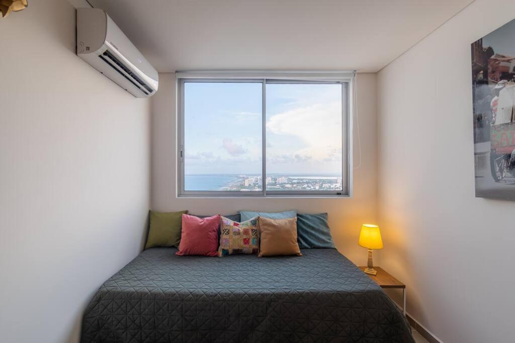 Galería Caribe 2 habitaciones en piso 24 cerca de la playa y centro histórico