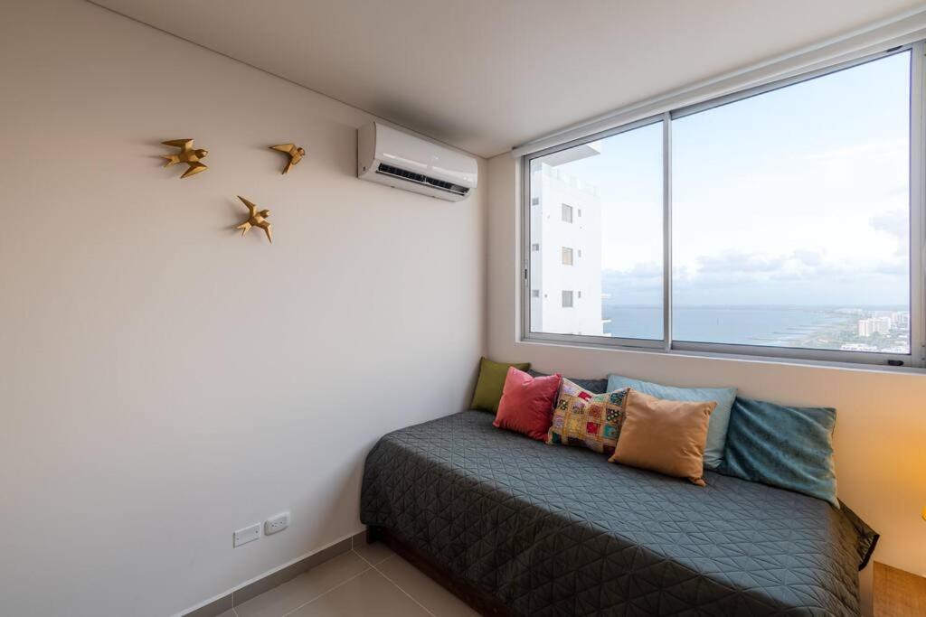 Galería Caribe 2 habitaciones en piso 24 cerca de la playa y centro histórico