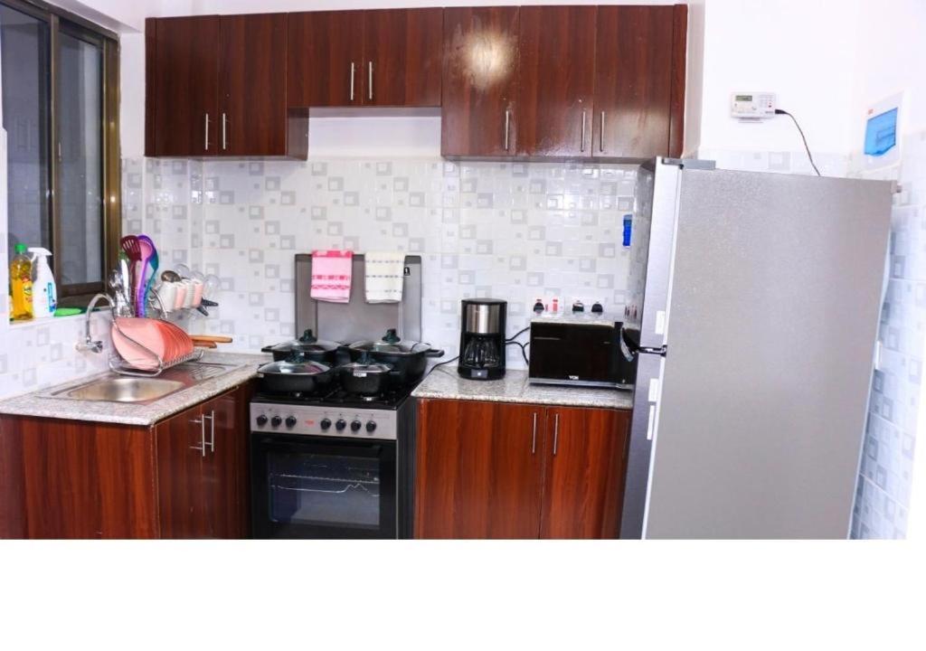 3 BEDROOM LIWANDO HOME at Greatwall Gardens next to Greatwall Mall, 15 Minutes from JKIA Airport With FREE WIFI & Parking, Enjoy Entire Unit in a Gated Com