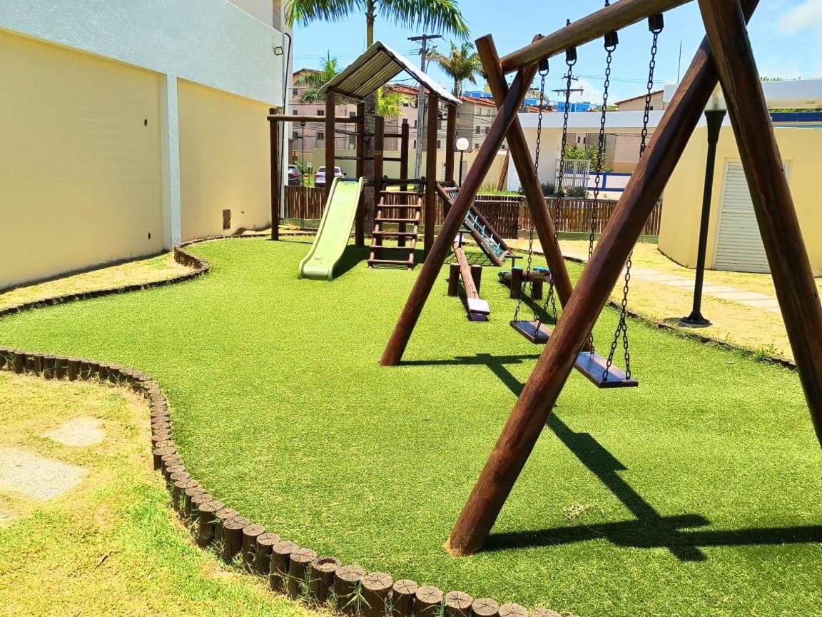 Apartamento aconchegante em condomínio perto da praia