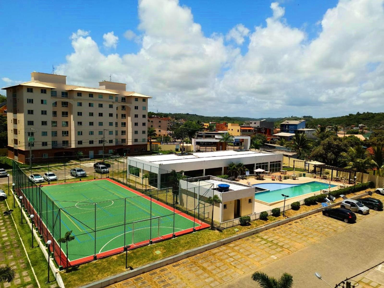 Apartamento aconchegante em condomínio perto da praia