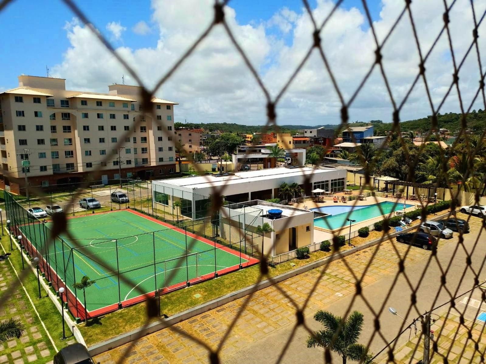 Apartamento aconchegante em condomínio perto da praia