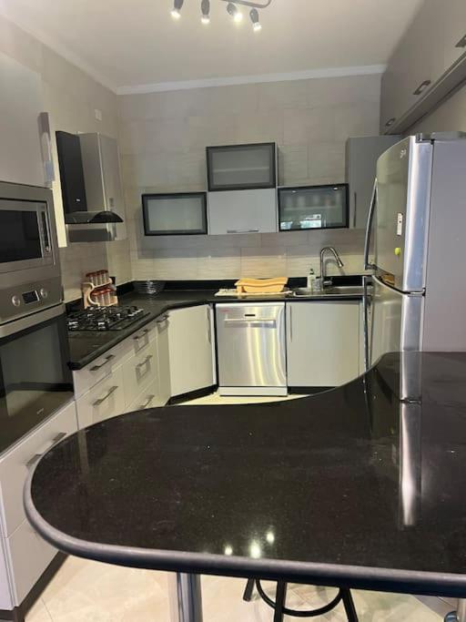 2BR Apartment with Private Garden in Downtown Rehab Near Malls