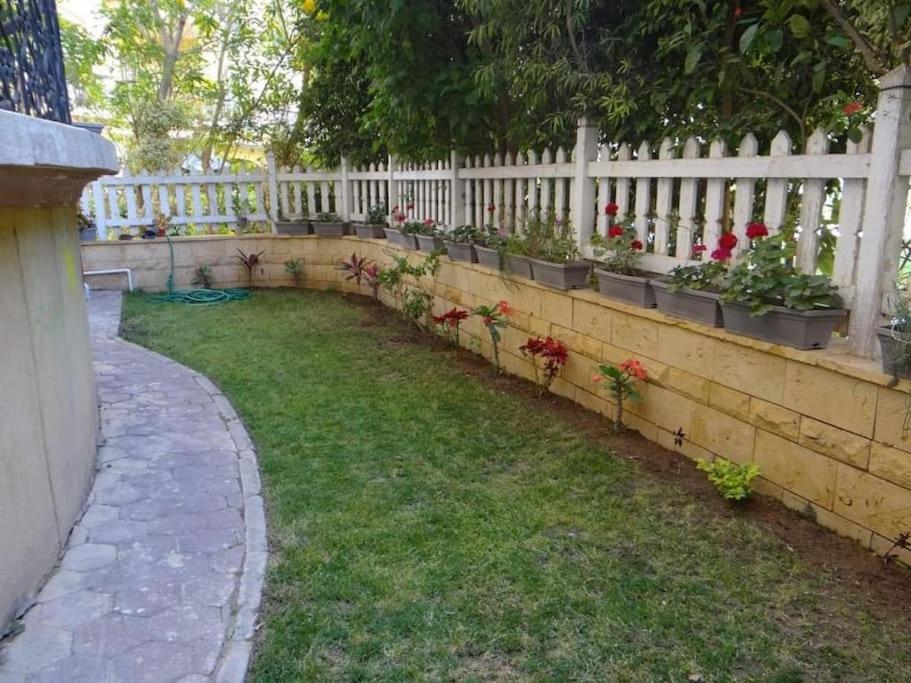 2BR Apartment with Private Garden in Downtown Rehab Near Malls