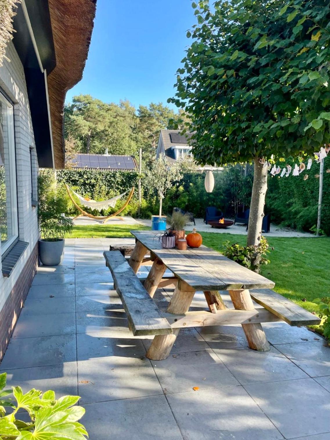 Vrijstaande woning met geweldige omheinde tuin aan bosrand view 3