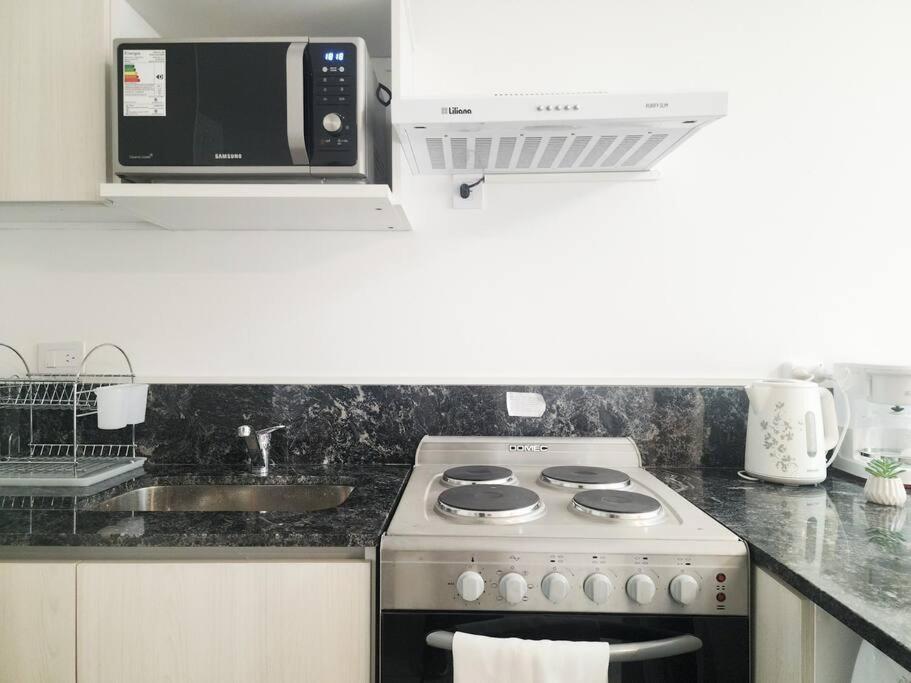 Moderno Studio con balcón ideal Working Nomads - Para estadías de 15 días o más
