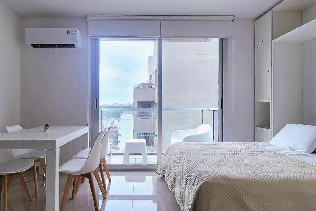 Moderno Studio con balcón ideal Working Nomads - Para estadías de 15 días o más