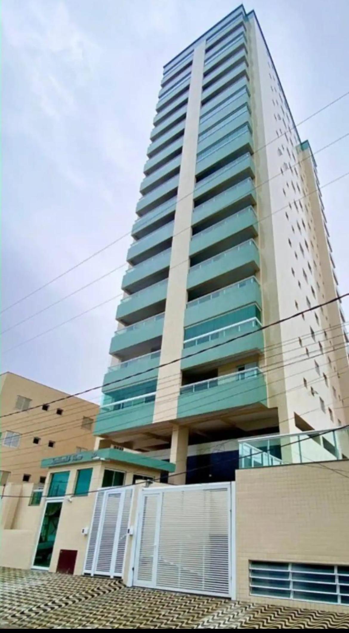 APTO BEIRA MAR - ACONCHEGANTE _ VARANDA GOURMET - WIFI - NETFLIX - TV A CABO - PRAIA GRANDE