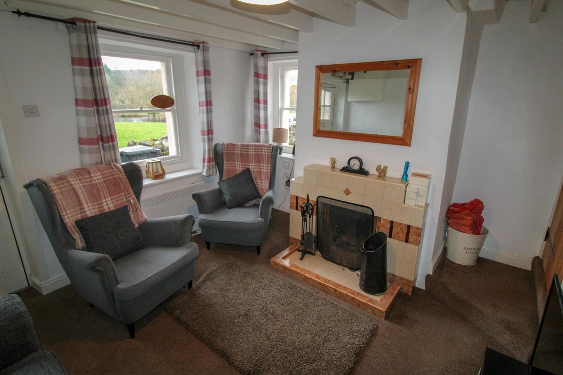 Greenside Cottage traditional cottage overlooking Caldbecks duck pond