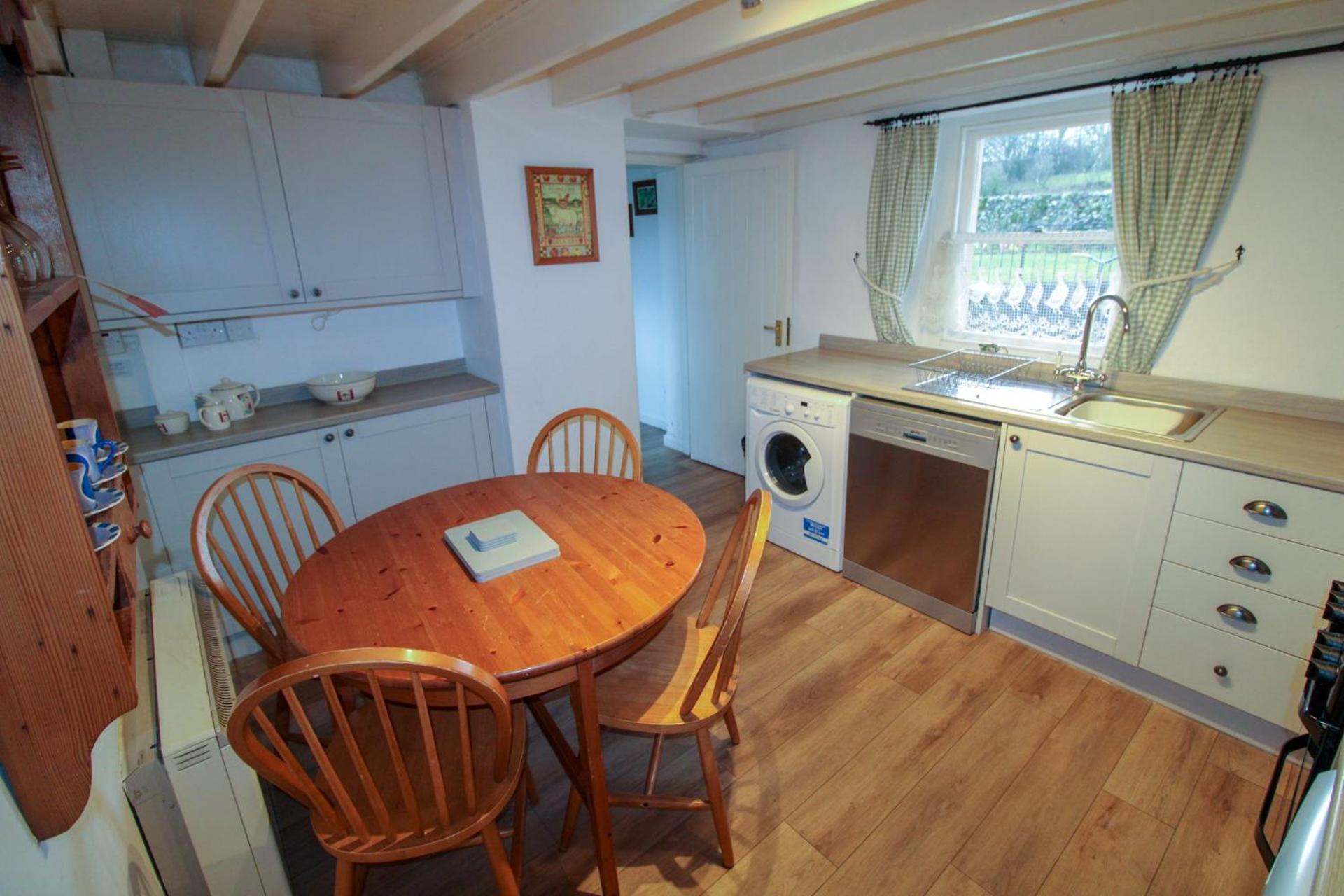 Greenside Cottage traditional cottage overlooking Caldbecks duck pond