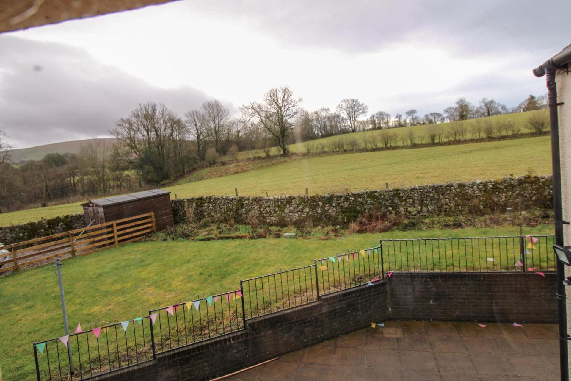 Greenside Cottage traditional cottage overlooking Caldbecks duck pond
