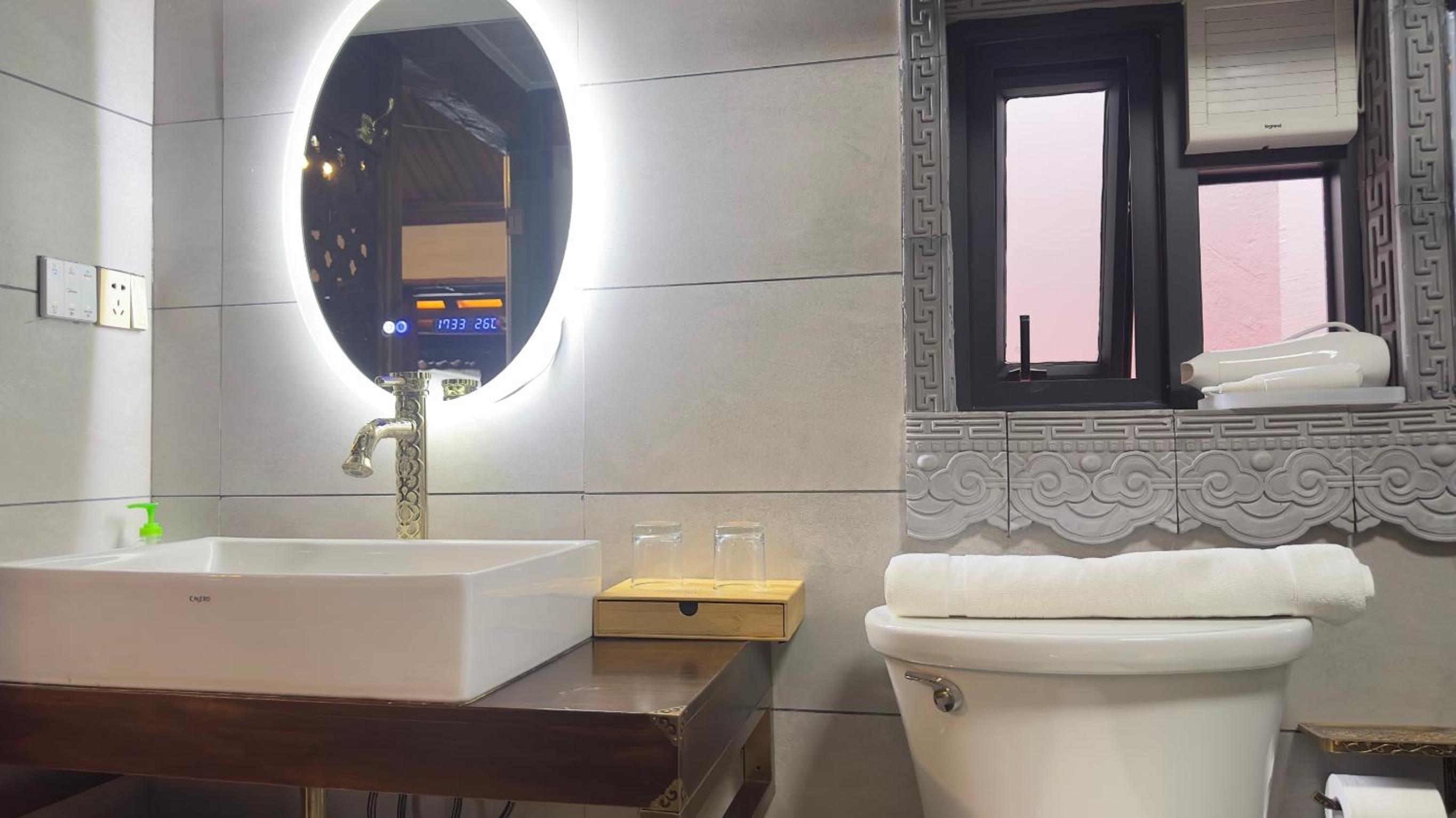 Qingxin Courtyard Art Guesthouse