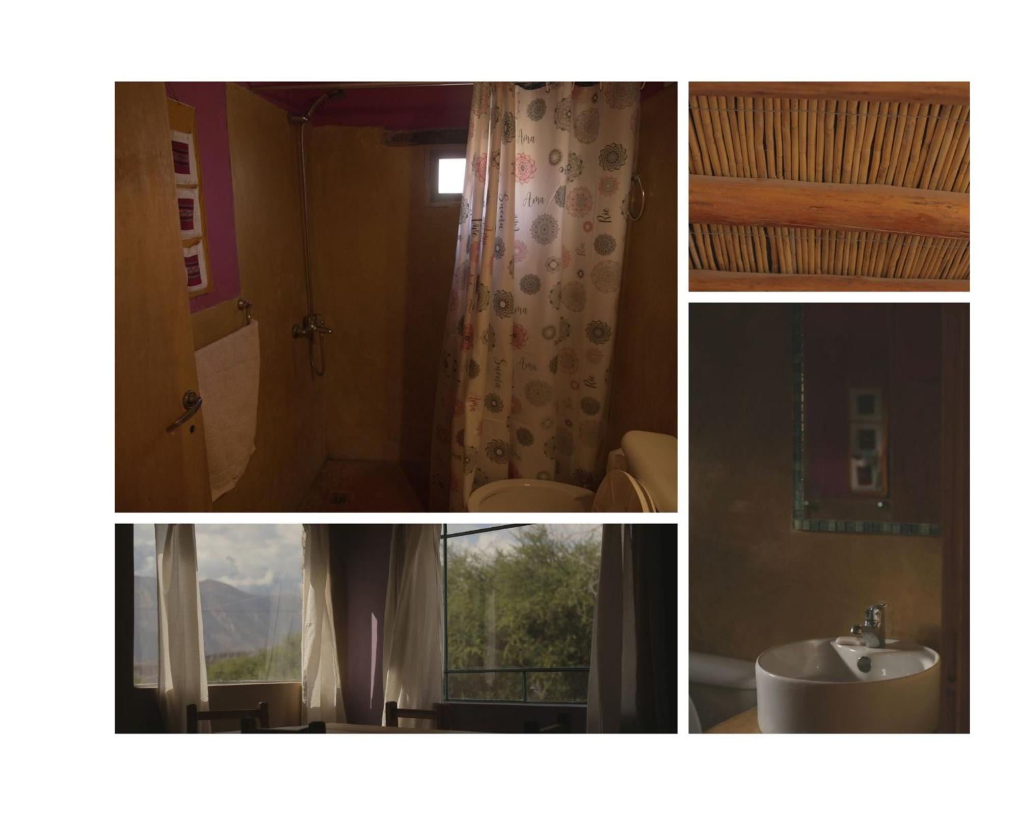 Macondo - Casas entre cerros