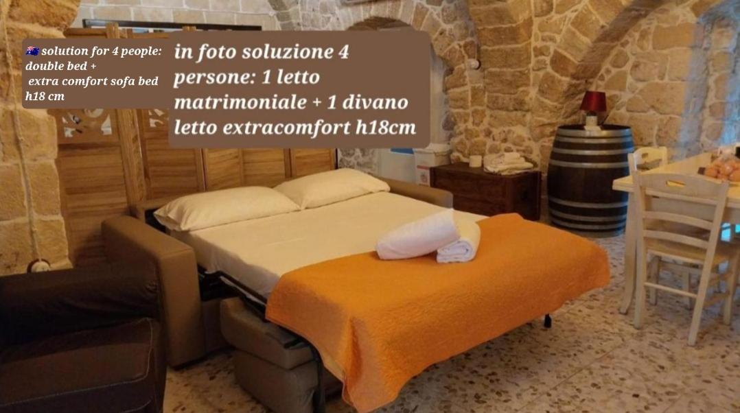 DOMUS CESARE - dimora storica totalmente in pietra nel cuore del centro storico con cabina doccia pietra in camera e zona relax esterna-historic residence  view 5