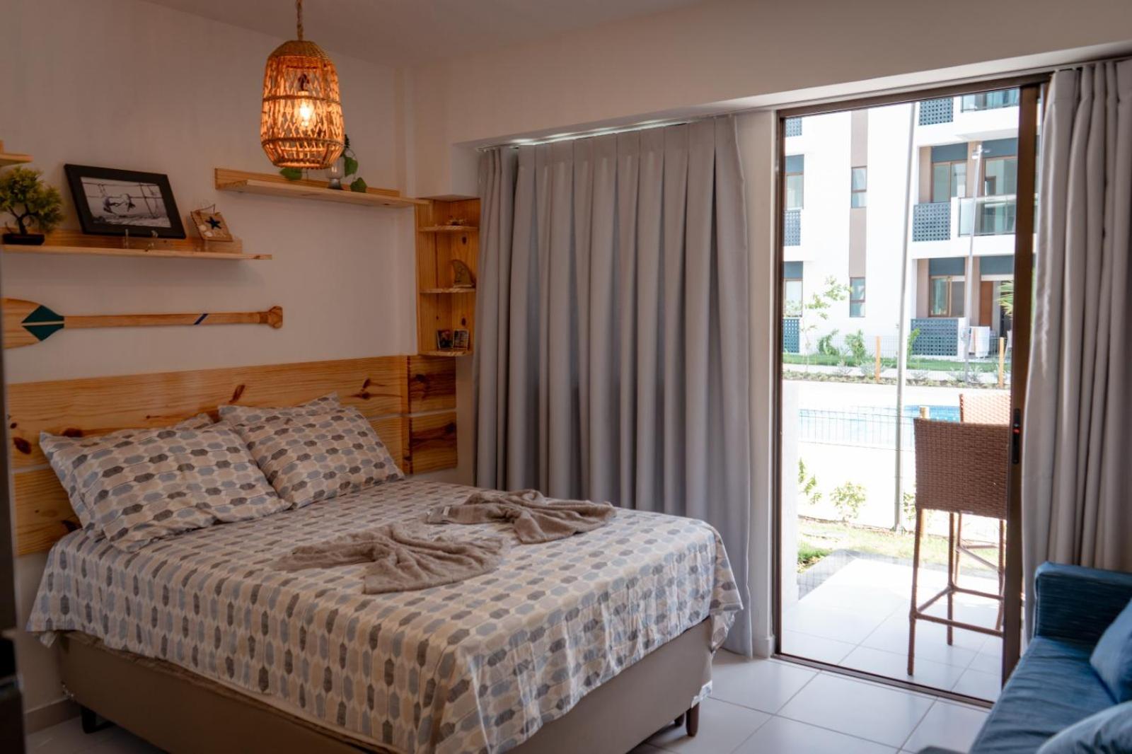 Resort em Porto de Galinhas- Flat Térreo Frente Piscinas- Muro Alto-B18