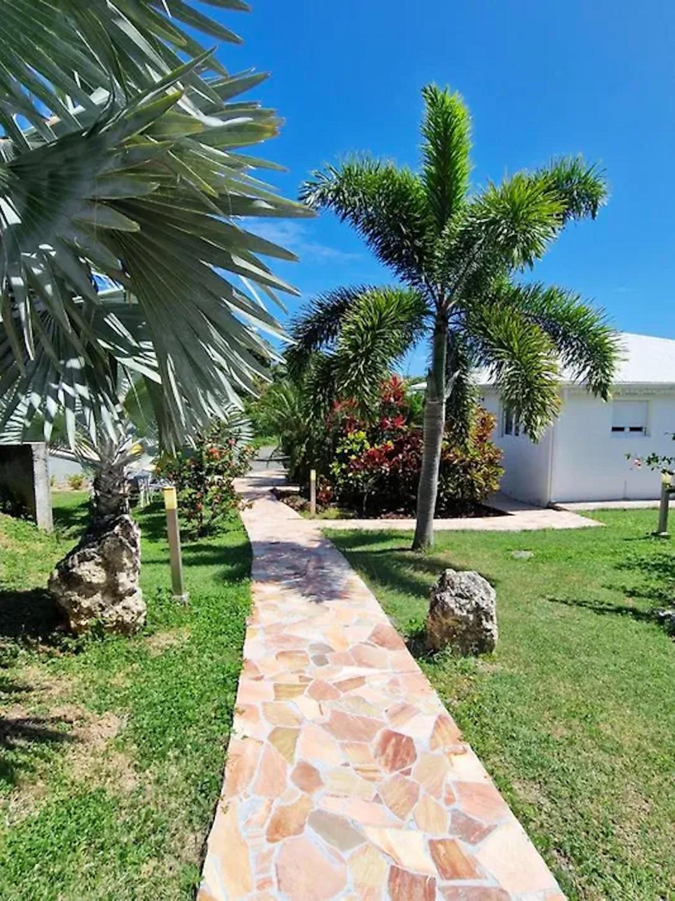 Maison charmante Le Moule avec piscine partagée