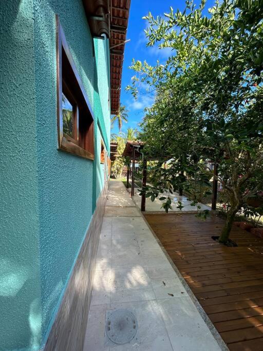 Casa de praia pé na areia: nos braços da natureza.