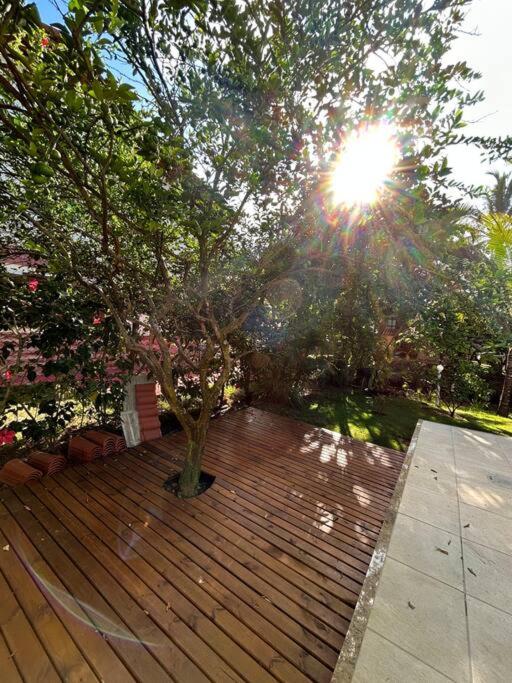 Casa de praia pé na areia: nos braços da natureza.