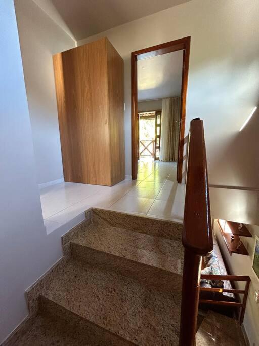 Casa de praia pé na areia: nos braços da natureza.