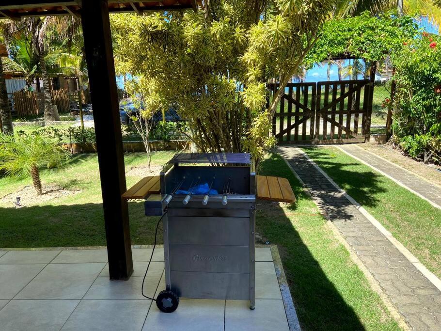 Casa de praia pé na areia: nos braços da natureza.