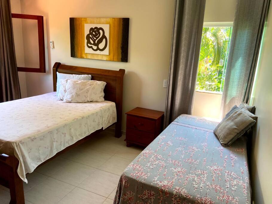 Casa de praia pé na areia: nos braços da natureza.