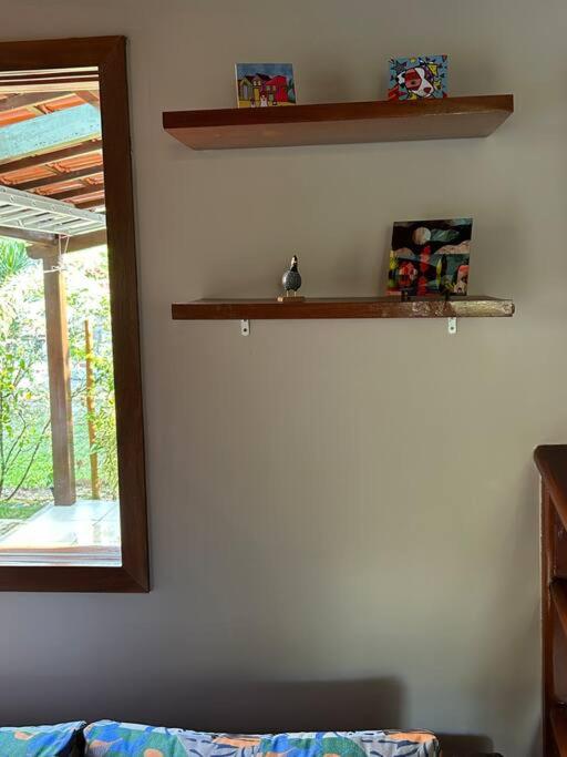 Casa de praia pé na areia: nos braços da natureza.