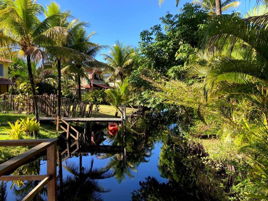 Casa de praia pé na areia: nos braços da natureza.
