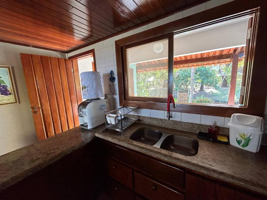Casa de praia pé na areia: nos braços da natureza.