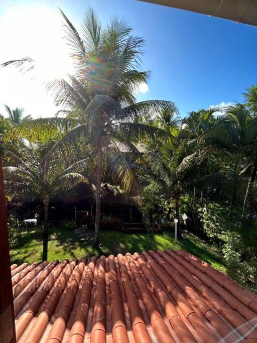 Casa de praia pé na areia: nos braços da natureza.