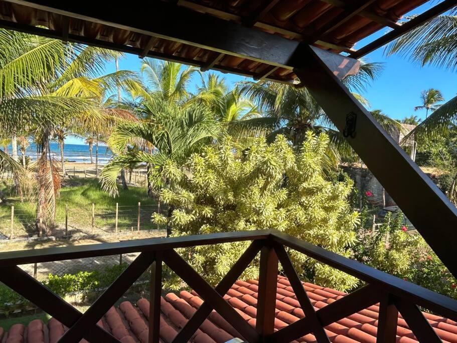 Casa de praia pé na areia: nos braços da natureza.