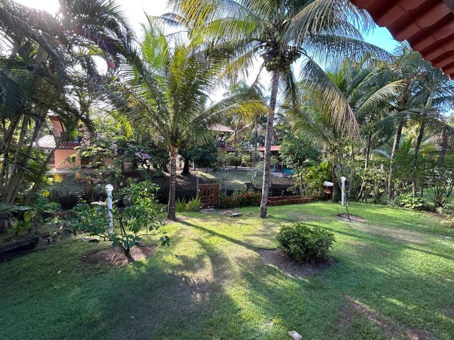 Casa de praia pé na areia: nos braços da natureza.