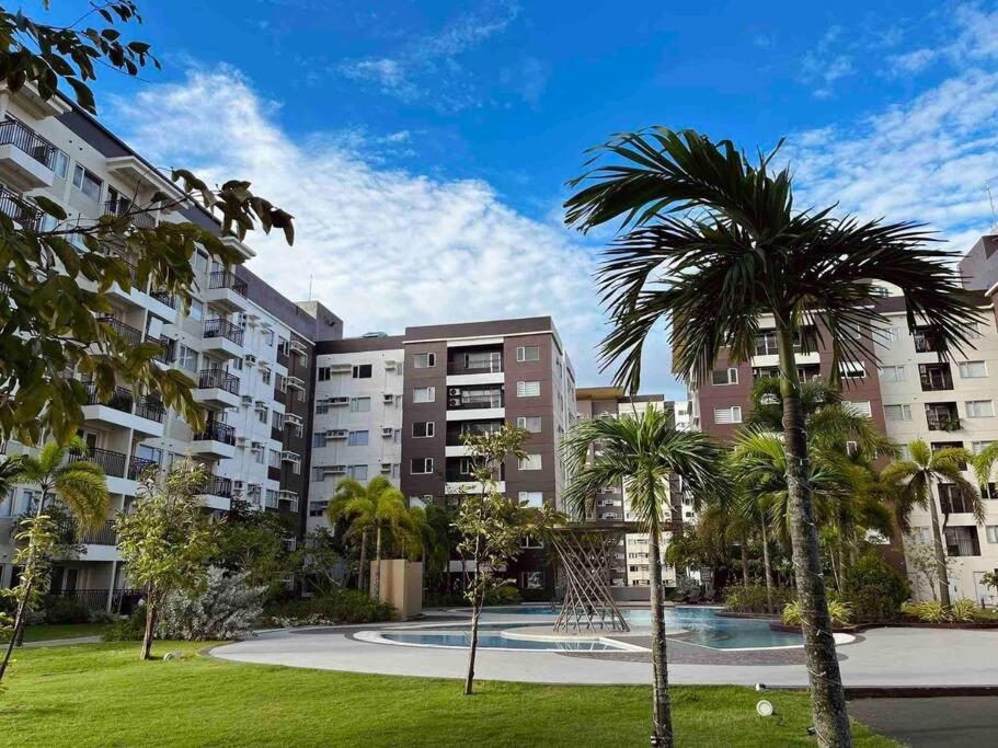 Stylish Iloilo condo w/ Netflix and pool access view 4